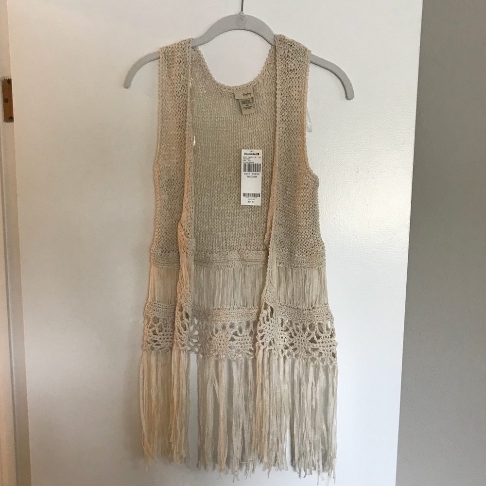 tan vest!